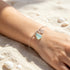 FREE Today: Aqua Sea Glass & Wave Charm Silver Bracelet - image 1