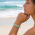 Supporting Ocean Cleanup Turtle Haven Reborn Bracelet – Recycled 8mm Frosted Gold-Speckled Glass Beads - image 1