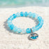 Tropical Fish Charm Bracelet - Blue Crackle Recycled 8mm Glass Beads  | Save Marine Life - Blue - Approx. 6.93"/17.6cm - image 2