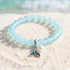 Save The Ocean Whale Bracelet - Recycled 8mm Frosted Sea Glass Beads With Whale Tail Charm - Light Blue - Approx. 6.93"/17.6cm - image 2