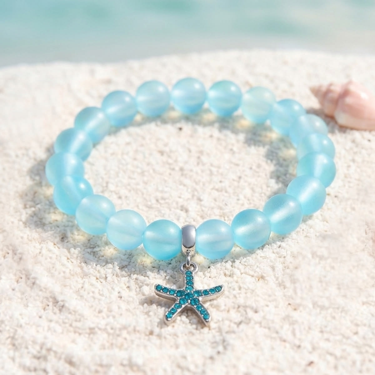 Supports Ocean Conservation Sea Stars Bracelet - Recycled 8mm Frosted Sea Glass Beads With Starfish Charm - Light Blue - Approx. 6.93"/17.6cm - image 2