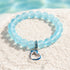 Ocean Guardian Dolphin Bracelet - Handmade Recycled 8mm Frosted Sea Glass Beads With Dolphin Charm - Light Blue - Approx. 6.93"/17.6cm - image 2