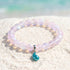 Supports Marine Life Ocean Drop Bracelet - Recycled 8mm Frosted Sea Glass Beads With Blue Teardrop Charm - Light Pink - Approx. 6.93"/17.6cm - image 19