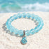 Aqua Blue Conch Bracelet - Recycled 8mm Frosted Sea Glass Beads That Save Marine Life - Light Blue - Approx. 6.93"/17.6cm - image 2