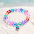 Save The Sea Light Blue Jellyfish Bracelet - Recycled 8mm Frosted Sea Glass Beads With Jellyfish Charm - Rainbow - Approx. 6.93"/17.6cm - image 7