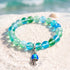 Save The Sea Light Blue Jellyfish Bracelet - Recycled 8mm Frosted Sea Glass Beads With Jellyfish Charm - Green - Approx. 6.93"/17.6cm - image 13