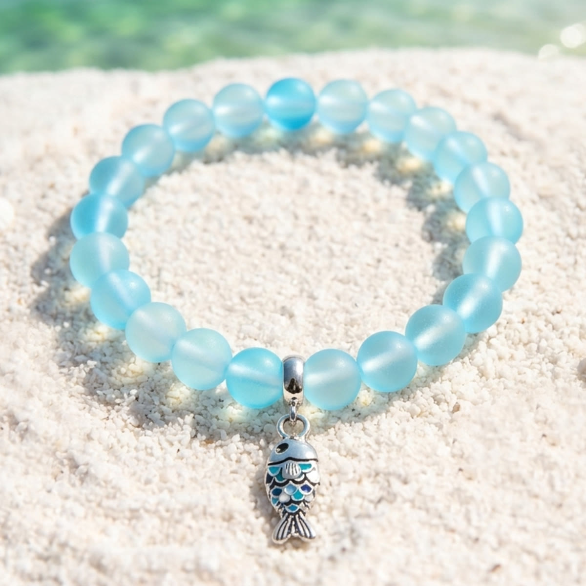 Supports Ocean Animal Rescue Bracelet - Recycled 8mm Frosted Sea Glass Beads With Blue Scaled Fish Charm - Light Blue - Approx. 6.93"/17.6cm - image 2