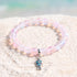 Supports Ocean Animal Rescue Bracelet - Recycled 8mm Frosted Sea Glass Beads With Blue Scaled Fish Charm - Light Pink - Approx. 6.93"/17.6cm - image 21