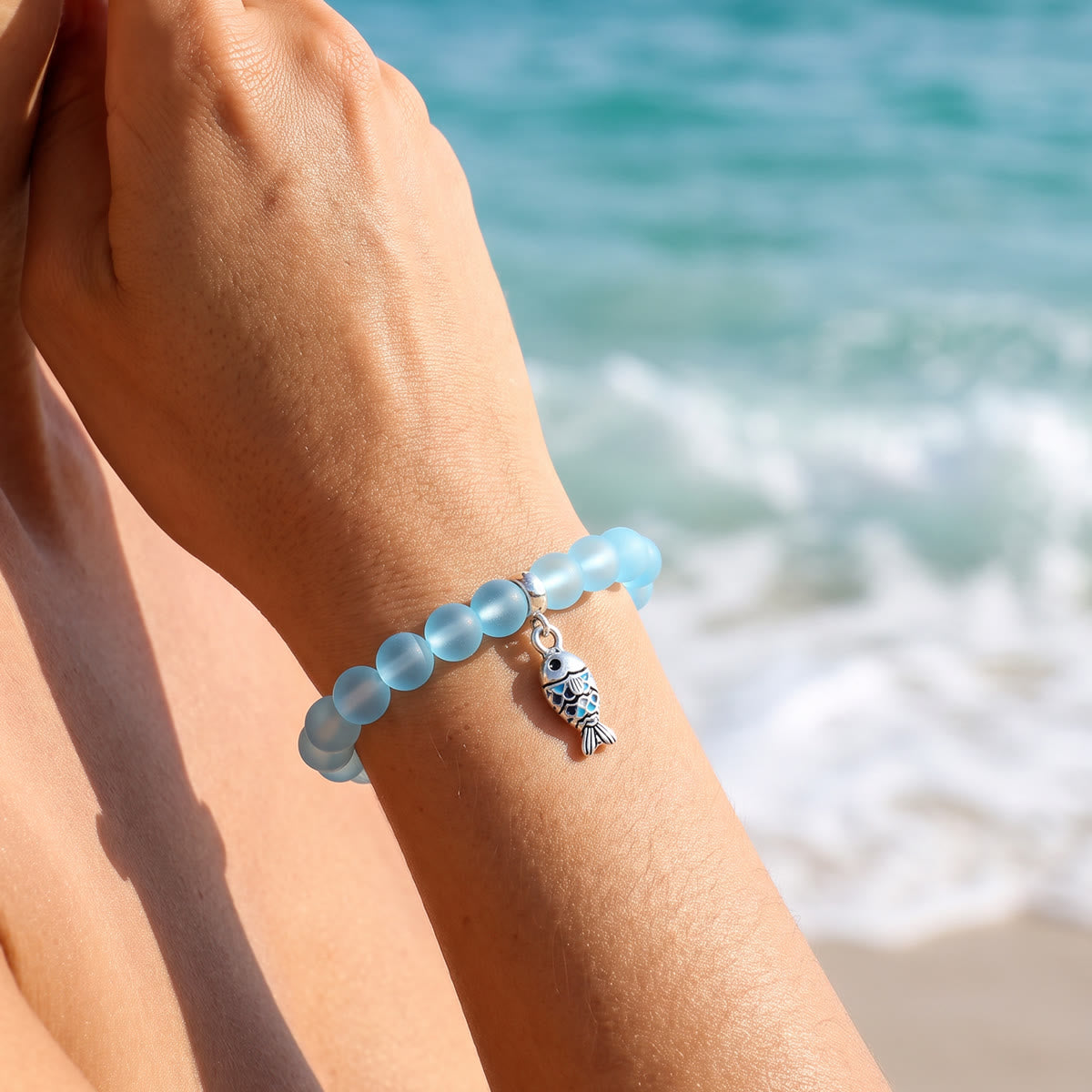 Supports Ocean Animal Rescue Bracelet - Recycled 8mm Frosted Sea Glass Beads With Blue Scaled Fish Charm - image 1
