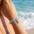 Supports Ocean Animal Rescue Bracelet - Recycled 8mm Frosted Sea Glass Beads With Blue Scaled Fish Charm - image 1