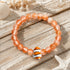 Clownfish Bracelet Made From Recycled Ocean Waste | Save The Reef - Recycled 8mm Frosted Sea Glass Beads - Orange - Approx. 6.93"/17.6cm - image 2