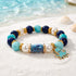FREE Today: Cute Octopus Blue Stone Beaded Bracelet - Bracelet With Gold Spacers And Aqua Octopus Charm - Octopus - 6.3" / 16cm (Stretchable) - image 0