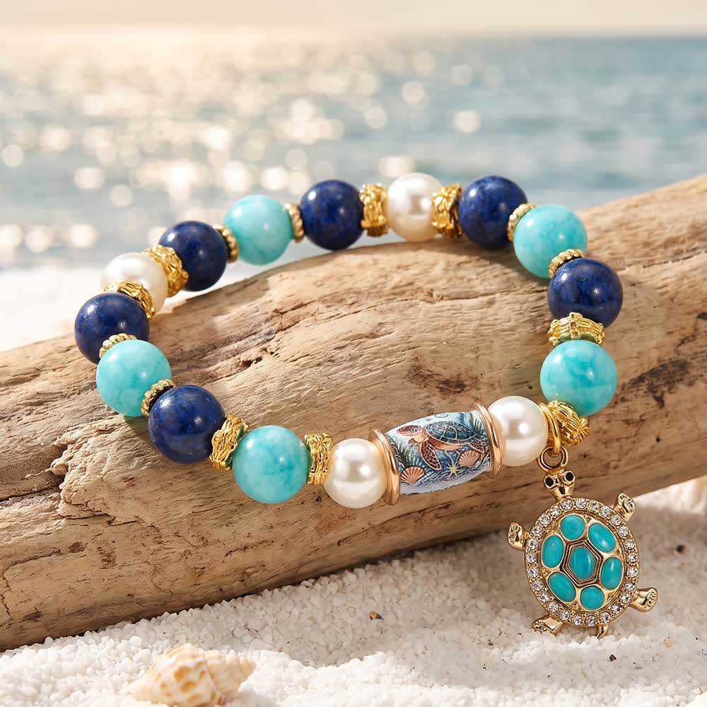 FREE Today: Save The Sea Turtles Bracelet - Ocean Blue Beaded Bracelet With Jeweled Sea Turtle Charm - Sea Turtle - 6.3" / 16cm (Stretchable) - image 0