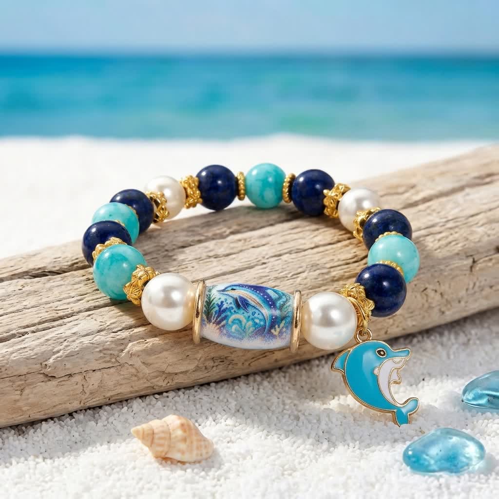 FREE Today: Save The Dolphin Family Stretch Bracelet - Ocean Blue Beaded Bracelet With Dolphin Charm - Dolphin - 6.3" / 16cm (Stretchable) - image 0