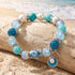 FREE Today: Protect Dolphins Awareness Bracelet - Dolphin Beaded Bracelet With Pearl Shell Charm - Dolphin & Shell - 6.3" / 16cm (Stretchable) - image 0